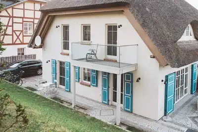 Image de Doppelhaushälfte mit Seeblick am Grenzweg in Ahrenshoop