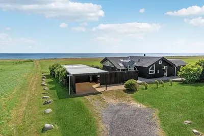 Image de Maison en bord de mer à Sæby avec WiFi