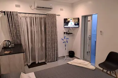 Image de Cosy place close to the highway on your way into VicFalls. . . you can't get lost!
