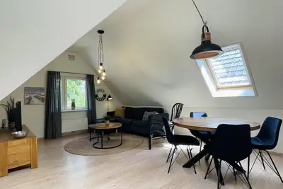 Very spacious and tastefully decorated 3-person appartment near forest, beach and sea with free Wifi, on quiet, green and small-scale holiday park