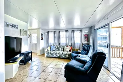 Dog-friendly bayfront home with in\/outdoor pools, tennis, gym, W\/D, bay views