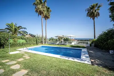 Image de 4-bedroom, 3-bathroom villa with a private pool, stunning sea and mountain views