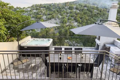 Image de Ferienhaus mit Whirlpool