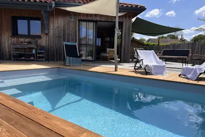 Image de Maison 8/10 pers bois, piscine proche Bassin
