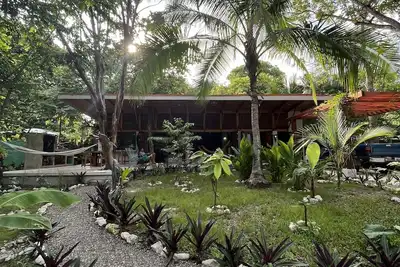 Image de Brand New, Private, beach house with tropical garden 200 meters walk to beach