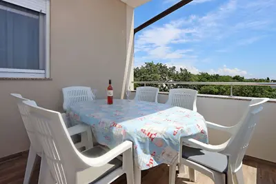Image de Appartement de deux chambres avec la terrasse et la vue sur le mer Potocnica, Pag (A-21446-a)