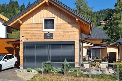 Image de Chalet with Ev charger, ski-in ski-out, public pool, near shops and restaurants