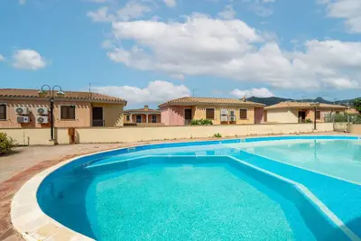 Image de Maison de vacances \"Il Nido Di Mennenne\" avec vue sur les montagnes, piscine partagée et Wi-Fi