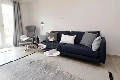 Image de Ferienwohnung mit Balkon und Sauna nur Wenige Schritte vom Strand Entfernt