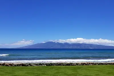 Image de Spectacular Oceanfront 1br condo at Papakea Resort, sunset view from unit L104