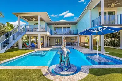 Image de Manatee Lookout: Canal Front, Pool, Spa, Dock, Putting Green by Anna Maria Life Vacation Rentals