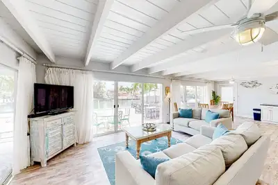 Image de Waterfront home with 60-foot dock & beautiful patio - walk to beach & golf