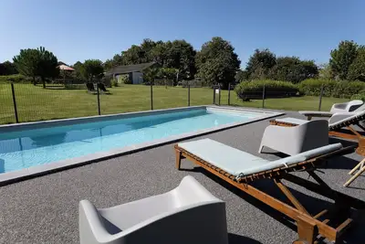 Image de Appartement 'Calme Campagne Piscine' avec piscine partagée, jardin partagé et Wi-Fi