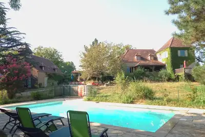 Image de Typical stone houses with pool surrounded by beautiful countryside
