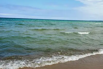 Image de Stroll down Merry Ln to the sandy bottom beach of your dreams Lake Huron