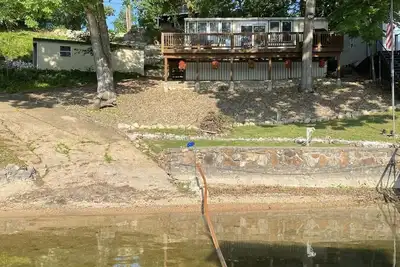 Image de Cozy family friendly lake home right on the water-amazing cove atmosphere