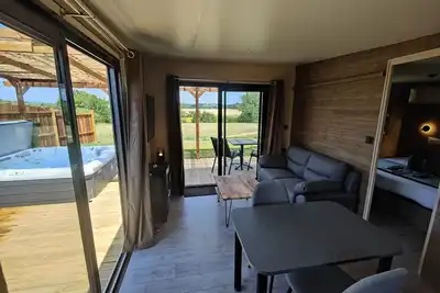 Image de Cottage l'Évasion avec jacuzzi privatif