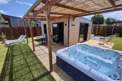 Image de Cottage la Romance avec Jacuzzi privatif