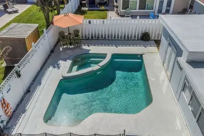 Image de Sunset Retreat | Walk to Beach + Dining, Pool