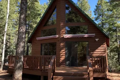 Image de Cozy Cabin nestled in the woods. Plenty of Snow Mobile and Atv Parking!