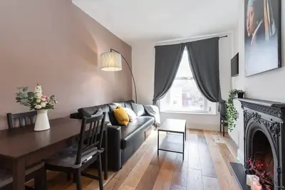 Image de Stylish Bright Apartment Great Location Fast Wi-Fi Tv