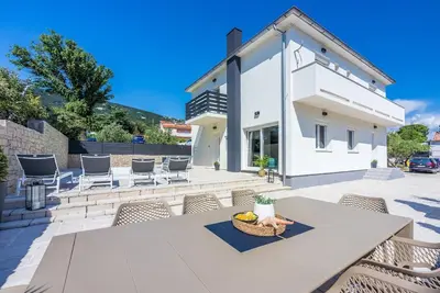 Image de Maison de vacances Baška pour 1 - 8 personnes avec 4 chambres à coucher - Maison de vacances