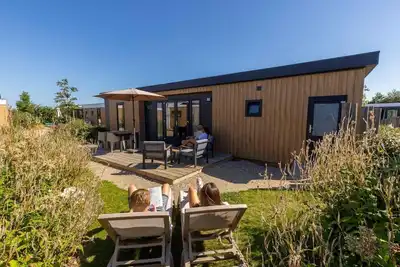 Image de Stay in the modern and spacious Zonneweelde Lodge and be on the beach in no time