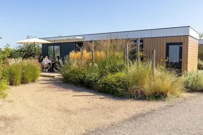 Image de Stay in the modern and spacious Zonnweelde Lodge and be on the beach in no time