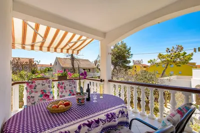 Image de Appartement de deux chambres avec la terrasse Povljana, Pag (A-21342-a)