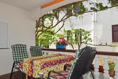Image de Appartement de deux chambres avec la terrasse Povljana, Pag (A-21342-c)