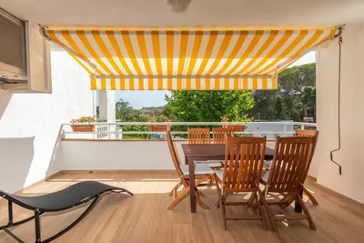 Image de Appartement de vacances 'Brava Beach' avec piscine partagée, terrasse privée et Wi-Fi