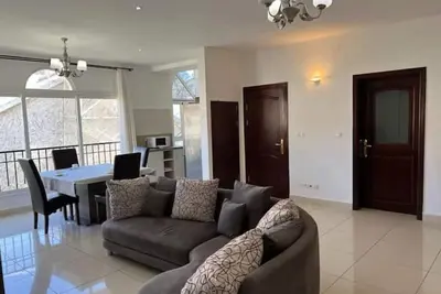 Image de Appartement 1 Chambre Climatisé 85 m² - Cuisine et Terrasse - Piscine Commune