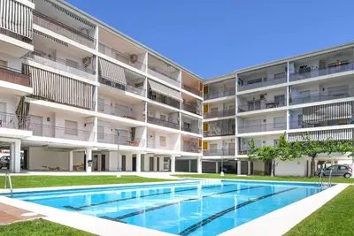 Image de Appartement de 1 chambre à coucher avec piscine commune