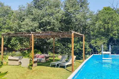 Image de Appartement de vacances \"La Pallissa - Can Bonet\" avec vue montagne, piscine partagée et Wi-Fi