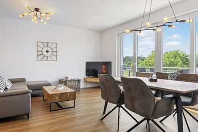 Image de First-class apartment for families on the Baltic Sea with balcony & infrared sauna -