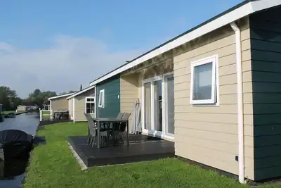 Image de Chalet avec deux salles de bain et un sloop, Ă Giethoorn