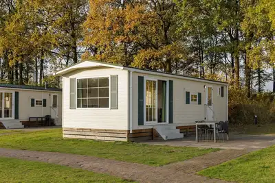 Image de Chalet bien meublé avec WiFi, près du Hunebedcentrum
