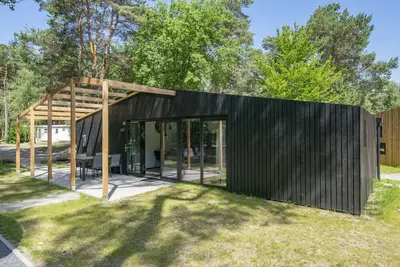 Image de Chalet moderne avec bien-ĂŞtre, dans un parc de vacances Ă 12 km depuis Eindhoven