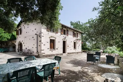 Image de Maison de vacances 'Bosco Littu' avec vue sur la montagne et jardin partagé