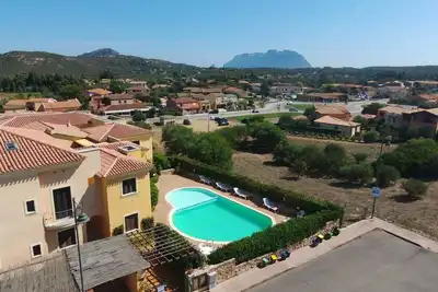 Image de Appartement 'Casa Vacanze Nespolo' avec piscine partagée, terrasse privée et climatisation