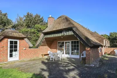 Image de Maison de vacances pour 8 a Løkken-By Traum