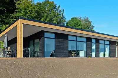 Image de Maison de vacances pour 8 a Sjølund-By Traum