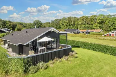 Image de Maison de vacances pour 6 a Sjølund-By Traum