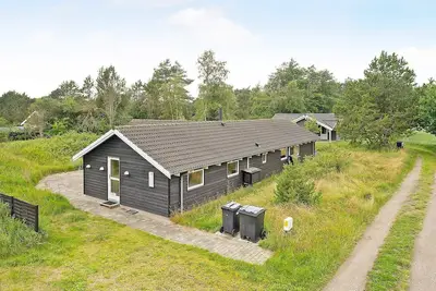 Image de Maison de vacances pour 10 a Ålbæk-By Traum