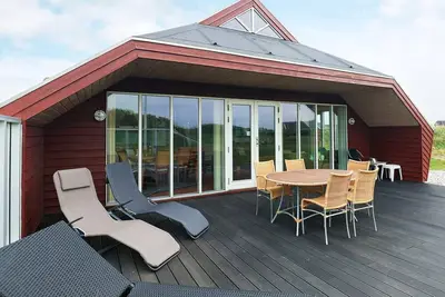 Image de Maison de vacances pour 8 a Løkken-By Traum