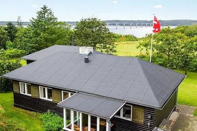 Image de Maison de vacances pour 8 a Roslev-By Traum