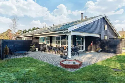 Image de Maison de vacances pour 12 a Væggerløse-By Traum