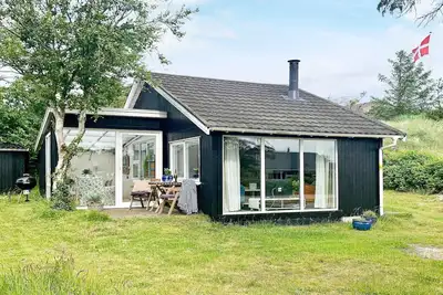 Image de Maison de vacances pour 4 a Blokhus-By Traum