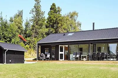Image de Maison de vacances pour 8 a Slagelse-By Traum