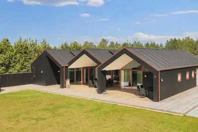 Image de Maison de vacances pour 10 a Jerup-By Traum